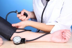 Blood pressure measuring on blue background