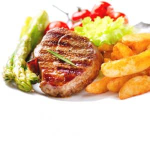 a single plate of food with steak, french fries, and asparagus