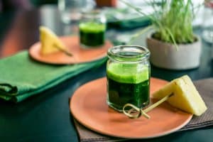 wheatgrass glass on table