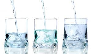 3 glasses showing water poured in