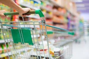 woman shopping at grocery store for keto food