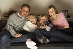 Family Watching Television Together