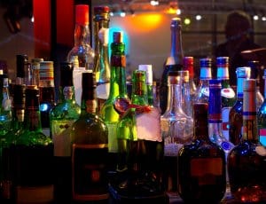 Assorted colorful bottles of alcoholic drinks in a night-club