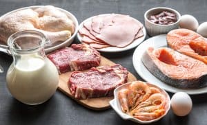 protein meats on wood background