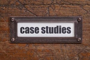 case studies - file cabinet label, bronze holder against grunge and scratched wood