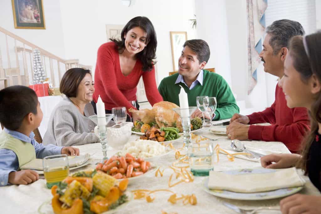 Family All Together At Christmas Dinner